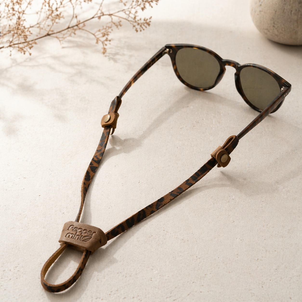 Strap cuero animal print café Peppermint cierre